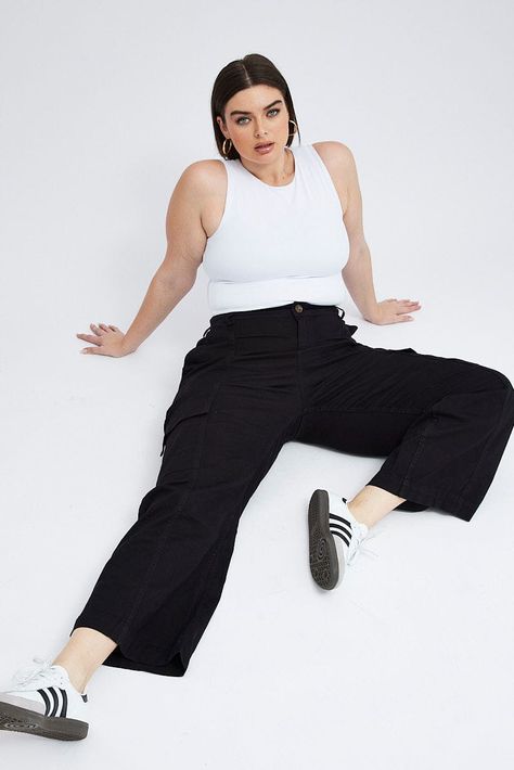 Plus size or curvy women's black cargo pants high rise. For 18-45 years old plus-size female. Designed in Australia, but made in overseas from quality fabric and material; imported. Machine wash cold Plus Size Cargo Pants Outfit, Womens Black Cargo Pants, Plus Size Cargo, Plus Size Cargo Pants, Cargo Pants Outfit, Black Cargo Pants, Black Cargo, 45 Years, Curvy Outfits