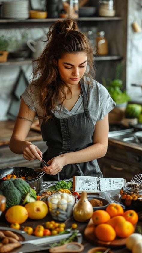 Cooking Fresh Meal: A young woman attentively prepares a nutritious dish using fresh vegetables and fruits in a rustic kitchen. #cooking #kitchen #vegetables #fruits #woman #aiart #aiphoto #stockcake ⬇️ Download and 📝 Prompt 👉 https://stockcake.com/i/cooking-fresh-meal_957338_800667 Chef Cooking Photography Kitchens, Woman Cooking Aesthetic, Chef Cooking Photography, Cucumber Mint Juice, Health Benefits Of Spinach, Soup Benefits, Chef Aesthetic, People Cooking, Mint Juice