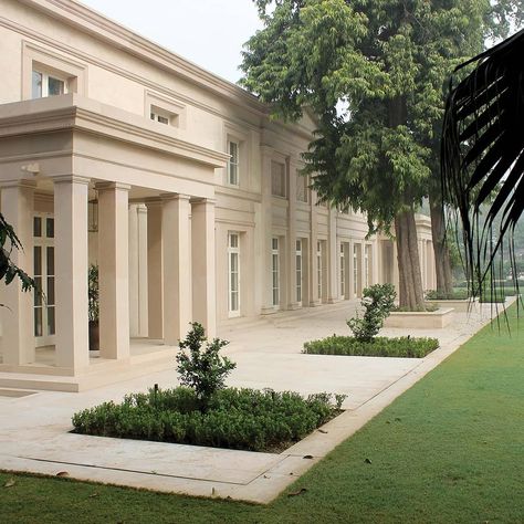 A modern classical villa in the heart of New Delhi, India, inspired by simple classical buildings of the Regency period, combined with Indian materials and traditions, sitting comfortably alongside the historic buildings nearby. Designed by @geosaumarezsmith with interior designer @kellingdesigns #classicalarchitect #classicalarchitecture #classicalcountryhouse #regencyinspiredhouse #localbuildingmaterials #localvernaculararchitecture #classicism #classicalhouse #newdelhi #india #adamarchitectur Modern Classical House, Adam Architecture, Classic Villa Design, Classical Villa, New Classical Architecture, Classical Building, Classical House, Best Modern House Design, Classic House Exterior