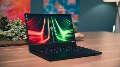 Razer Blade 14 Review: A Compact Gaming Powerhouse . Are you looking for a premium gaming laptop that can handle any game and fit in any bag? If so, you might want to check out the Razer Blade 14, one of the most popular gaming laptops in the market. In this review, we will tell you everything you need to know about this laptop, including its design, performance, battery life, and how it compares to its competitors. . Continue reading at....... https://promojoyz.com/razer-blade-14-review-a-c... Razer Blade, Best Gaming Laptop, Hardware Components, Video Game Genre, Gaming Laptop, Playing Video Games, Cyberpunk 2077, Gaming Laptops, Gaming Setup