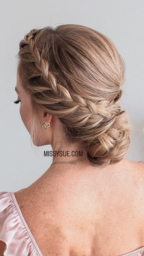 Braided Low Bun Wedding, Updos For Bridesmaids With Braids, Braid Low Bun Wedding Hair, Low Bun With Braid Wedding Hair, Low Bun Braid Hairstyles, Braid Buns Hairstyles, Buns For Prom, Grad Updos, Braided Low Bun Hairstyles