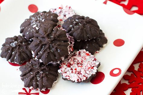 Peppermint Bark Snowflake Spritz Cookies from @bake.love.give. #fbcookieswap Spritz Cookies, Christmas Cookie Exchange, Filled Cookies, Chocolate Dipped Strawberries, Cookie Press, Cookie Swap, Strawberry Dip, Peppermint Bark, Xmas Cookies