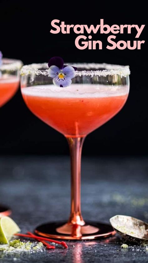 The luscious Strawberry Gin Sour cocktail offers a tantalizing blend of flavors that will captivate any palate. Combining fresh strawberries, gin, St. Germain elderflower liqueur, and a touch of tangy lime juice, this drink strikes a harmonious balance between fruity sweetness and floral elegance. #StrawberryGinSour Gin And Strawberry Cocktail, Strawberry Gin Fizz, Strawberry Sour Cocktail, Gin St Germain Cocktail, Gin Strawberry Cocktail, Strawberry Gin And Tonic, St Germain Cocktail Recipes, St Germain Cocktail, Date Night Cocktails