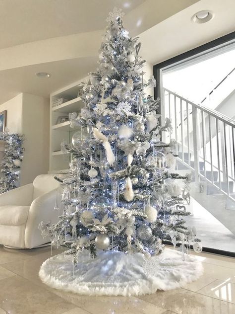 100 White Christmas Decor Ideas Which are Effortlessly Elegant & Luxurious - Hike n Dip White And Light Blue Christmas Tree, Blue And Silver Flocked Christmas Tree, White Silver And Blue Christmas Tree, White Christmas Tree Blue Lights, Silver And Light Blue Christmas Tree, Silver White Blue Christmas Tree, Modern Blue Christmas Tree, All Silver Christmas Tree, White Silver And Blue Christmas Decor