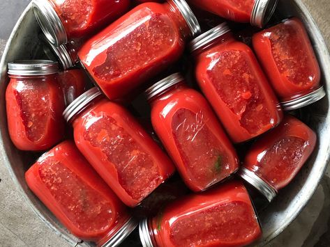 Canned tomato passata from Anthony Giglio is the easiest way to preserve an abundance of seasonal tomatoes and put them to good use in this simple tomato sauce recipe. Home canning is simple and approachable with just a few ingredients and a mason jar. Summer Tomato Recipe, Tomato Passata, Easy Tomato Sauce, Canned Tomatoes, Tomato Puree, Tomato Sauce Recipe, Summer Tomato, Canning Tomatoes, Juicy Tomatoes