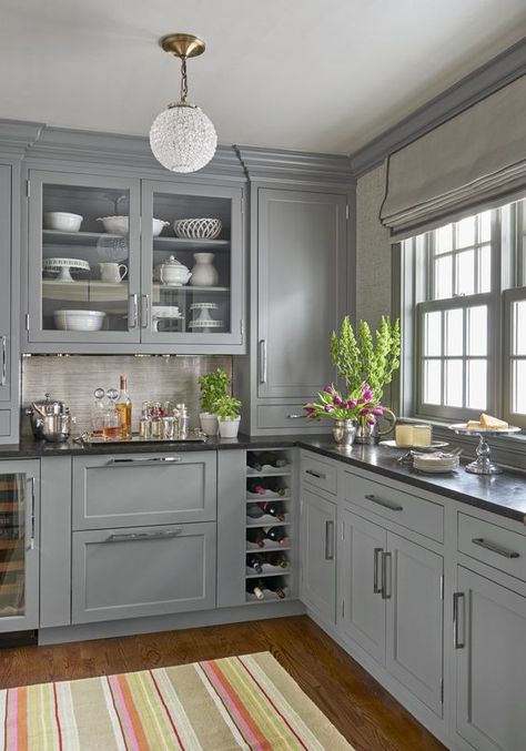 gray and black kitchen - from ThisOldHouse Black Kitchen Countertops, 1970s Kitchen, Серая Кухня, Outdoor Kitchen Countertops, Grey Kitchen Designs, Black Granite Countertops, Refacing Kitchen Cabinets, Black Countertops, Kabinet Dapur