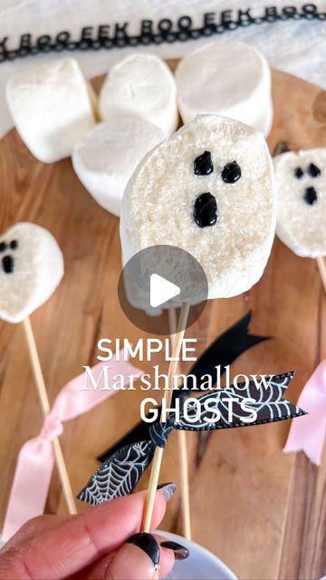 Andrea Clawson on Instagram: "Halloween treat idea: marshmallow ghosties 👻   These Halloween treats are so simple to recreate and will be perfect for any spooky night!   I took a jumbo @kraftjetpuffed marshmallows and cut them in half. I dipped them in white shimmer sugar and added a ghost face using black writing icing.  My boys loved adding them to their hot chocolate this morning. They would be perfect for Halloween s’mores or on top of cupcakes too!  Save for inspo and share with friends!   #halloweentreats #halloweenparty #halloweenpartyfood #halloweenkidsparty #craftymom #craftymomma #fallparty #partyideas #hostingaparty #halloweendesserts #halloweenfood #halloweensnacks #targethalloween #targetdollarspot" Marshmellow Treats, Writing Icing, Halloween Kids Crafts Easy, Marshmallow Ghosts, Marshmallow Halloween, Target Halloween, Halloween Treats For Kids, Spooky Night, Marshmallow Treats