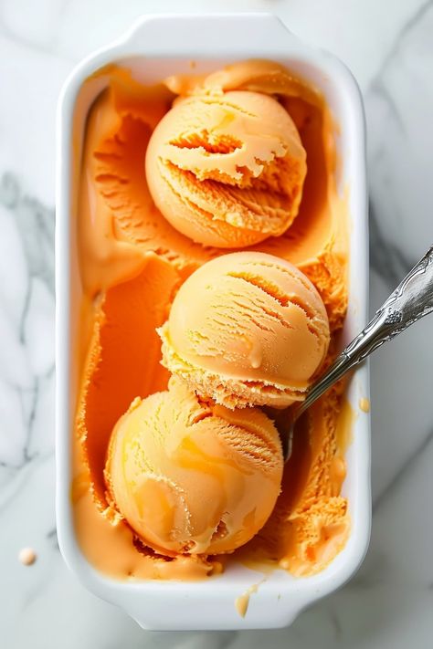 This easy orange sorbet is so tasty and refreshing! With just 4 ingredients, you'll have a homemade treat no one can resist. Sorbet Aesthetic, Orange Sorbet Recipe, Orange Gelato, Sunday Bread, Ice Cream Lab, Frozen Treats Recipes, Ice Cream Recipes Machine, Ice Cream Wallpaper, Watermelon Sorbet