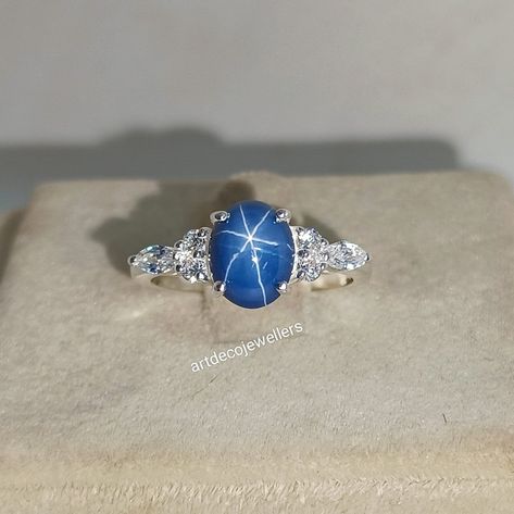 Excited to share the latest addition to my #etsy shop: Vintage Blue Star Sapphire Engagement Ring, Star Gemstone, Lindy Star Ring, 925 Sterling Silver, oval gemstone, Gift for Her https://etsy.me/3OtXYYH #stone #ethicalgemstones #oval #cathedral #prong #artdeco #no #wh Star Sapphire Ring Vintage, Star Sapphire Engagement Ring, Star Sapphire Stone, Star Sapphire Ring, Blue Star Sapphire, Dream Engagement, Star Sapphire, Dream Engagement Rings, Sapphire Engagement Ring