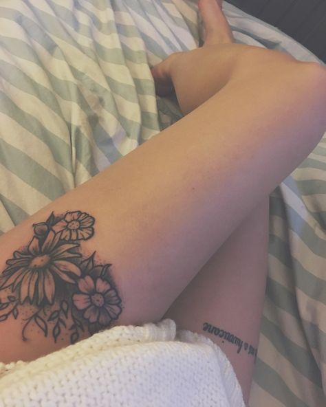 wildflower thigh tattoo Thigh Tattoo Simple, Tattoos Thigh, Small Thigh Tattoos, Sunflower Tattoo Thigh, Upper Leg Tattoos, Upper Thigh Tattoos, Sunflower Tattoo Sleeve, Sunflower Tattoo Shoulder, Tattoo Placements