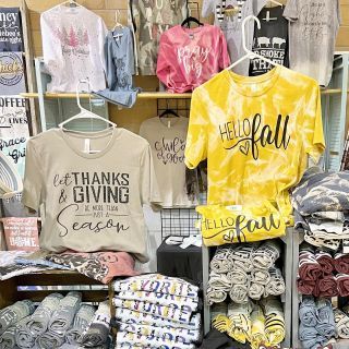 T Shirt Booth Display Craft Fairs, Display Shirts At Craft Fair, Tshirt Vendor Display Ideas, Vendor Shirt Display, T Shirt Vendor Booth Display Ideas Diy, Craft Show Checkout Station, How To Display Tshirts At A Craft Fair, Tshirt Vendor Booth Setup, How To Display Shirts At Craft Show