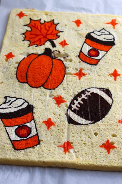 Roll Cake With Design, Fall Cake Roll Recipes, Patterned Cake Roll Recipes, Thanksgiving Swiss Roll Cake, Rolled Cakes With Designs, Thanksgiving Swiss Roll, Halloween Swiss Roll, Fall Roll Cake, Fall Themed Cake Ideas