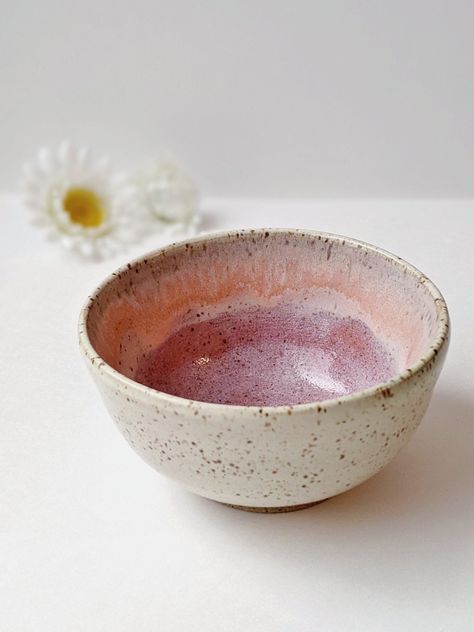 ITEM DESCRIPTION  Speckled Pink Bowl, Made to Order Enjoy your morning bowl of yogurt and granola or evening snack of ice cream with this speckled pink bowl.  Minimal, sweet, and hand crafted in Canada, this bowl is perfect for small meals, desserts and snacks!  Like melted strawberry ice cream on a nice sunny summer afternoon, this bowl is made to  bring a a touch of sweetness and warmth to your everyday.  This listing is for 1 wheel thrown small bowl, a set of 2 or set of 4 bowls.  Dimensions: Speckled Ceramic Bowl, Pretty Bowls Ceramics, Hand Thrown Bowls, Pottery Wheel Bowls, Cereal Bowl Ceramics, Ceramic Bowl Ideas Design, Glazed Ceramic Bowls, Small Ceramic Bowls, Ceramic Breakfast Bowl