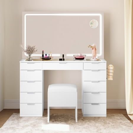 Product Description Elevate your beauty corner with this elegant white Vanity Desk Set. The combination of a LED lighted mirror, glass top, and ample storage ensures both style and functionality. It's an ideal gift for your loved ones on birthdays, holidays, or special occasions. Whether you're getting ready for a night out or a professional live broadcast, this vanity desk set is a perfect choice for creating a personalized and organized beauty space. Specifications Color :White Material:Engineered Wood Product Dimensions :11.7"D x 46.06"W x 55.9"H Fabric Type :Mdf Size: One Size. Glass Vanity Ideas, Cute Bedroom Vanity, Vanity Ideas Bedroom Glass Top, Desk With Vanity Mirror, Vanity Desk With Mirror And Lights, White Vanity Bedroom, Vanities For Bedrooms, Vanity Desk Organization, Cute Vanity Ideas