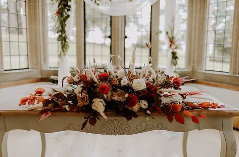 Ceremony Table Flowers Burnt Orange Wedding Sian Hall Photography #wedding #weddingflowers Boho Burnt Orange Wedding, Top Table Flowers, Ceremony Table, Burnt Orange Wedding, Flower Runner, Burnt Orange Top, Orange Wedding Flowers, Burnt Orange Weddings, Floral Wedding Cake