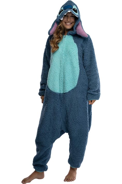 PRICES MAY VARY. 100% Polyester Zipper closure Machine Wash OFFICIALLY LICENSED DISNEY KIGURUMI UNION SUIT, GUARANTEED DETAILED STITCH FACE DESIGN ON HOOD - Features high-quality embroidered character eyes and nose on the hood as well as 3D felt teeth and puffy ears SUPER SOFT SHERPA FLEECE - This Stitch pajama union suit is made of an ultra-soft, fuzzy sherpa fleece fabric that is sure to keep you comfy and warm whether your hanging at the house, a Halloween party or a costume convention LOOSE, Stitch Pajamas, Lilo Und Stitch, Pajama Costume, Pajama Outfit, Union Suit, One Piece Clothing, Pajama Outfits, Lilo Stitch, One Piece Pajamas