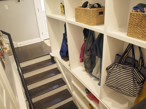 Tuck a mudroom anywhere you can find space, even along the stairs Stairway Storage, Entry Remodel, Basement Stairway, Split Entry Remodel, Basement Stairwell, Coat And Shoe Storage, Basement Staircase, Finish Basement, Basement Steps