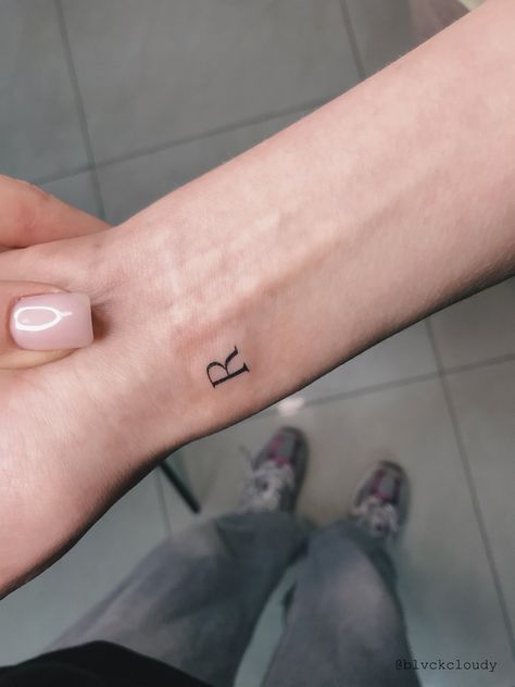 Small Wrist Tattoos Initials, H Wrist Tattoo, Small Letter Wrist Tattoo, Tattoo Ideas Letters Initial, Wrist Letter Tattoos For Women, Tiny Letter Tattoo Wrist, Man Tattoo For Wife, Initial On Wrist Tattoo, Letter On Wrist Tattoo