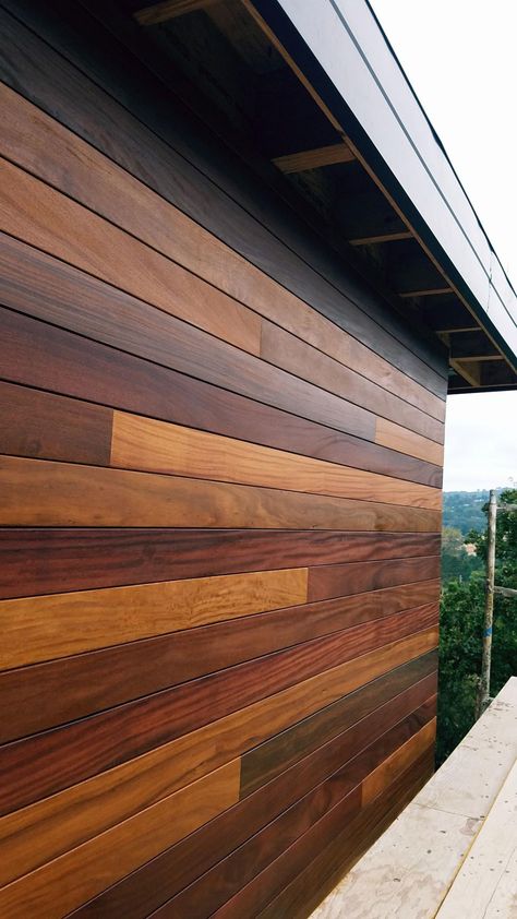 Wood Look Exterior Cladding, Cork Exterior Siding, Exterior Wood Paneling Siding, Wooden Siding Exterior, Panel Siding Exterior, Siding Alternatives, Exterior Wood Paneling, Wood Fascia, Siding Ideas Exterior