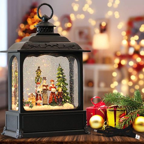 PRICES MAY VARY. ♬Christmas Music Snow Globe Lantern: Our singing snow globe is made by high quality durable plastic allow it will keep company with you for years. 7 x 3.5 x 11.2 Inches fit for mostly centerpiece decoration, adorable Carolers figurine scene more attractive and beautiful ♬USB PLUG-IN & BATTERY OPERATED: Each black snow globe lantern requires 3 AA batteries(Not Included), over 80 hours long lasting life with batteries. Or you can use the USB cable included in package to light up t Globe Lantern, Lantern Gift, Lantern Christmas, Musical Snow Globes, Lantern Ideas, Christmas Decorations For Kids, Christmas Musical, Christmas Snow Globes, Christmas Lanterns