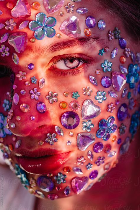 Closeup beauty portrait of face covered with crystals in unusual light by Liliya Rodnikova for Stocksy United Creative Full Body Portrait Photography, Unusual Portrait Photography, Unusual Photoshoot Ideas, Stickers On Face, Artistic Photoshoot, Unusual Photography, Unusual Portraits, Sticker Face, Face Art Makeup