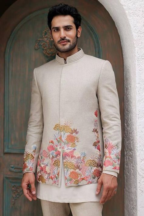 Check out these stunning and fresh tropical-themed outfits for grooms, from pastel bandhgalas to unique floral kurtas. Perfect for your exotic wedding! Beige Bandhgala, Indo Western Men, Groom Indian Wedding Outfits, Tropical Outfits, Indian Wedding Clothes For Men, Wedding Kurta, Wedding Kurta For Men, Haldi Outfits, Groom Dress Men