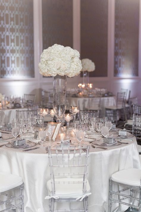 Elegant white and silver wedding reception Silver Wedding Reception, Crystal Wedding Theme, White And Silver Wedding, Silver Wedding Theme, White Silver Wedding, Silver Wedding Decorations, White Weddings Reception, White Wedding Decorations, Blue White Weddings