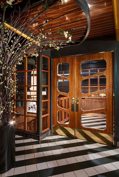 Art Deco doors of teak and brass lead to the downstairs dining room’s suspended steel staircase. Restaurant Doors, Restaurant Door, Art Deco Doors, Steel Staircase, Art Deco Door, Steel Door Design, Design Café, Marble Bar, Art Deco Interior Design