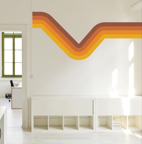 Choose from a range of color and size options to perfectly complement your existing decor. Whether you're creating a retro-themed room or adding a funky accent to your walls, our 70's Inspired Retro Wall Decal will transport you back in time with its vibrant orange and brown hues. Unleash your inner disco spirit and bring a retro flair to your home decor today! {MATERIAL OPTIONS} Peel and Stick Fabric Material--   This type of decal is made from a canvas fabric-like material that allows for effo Wall Decal Line Art, Stripes Tv Wall, Mcm Wall Paint Patterns, 70s Lines On Wall, 70s Stripe Wall Mural, Graphic Wall Design, 70s Stripe Wall, Retro Accent Wall, Retro Mural