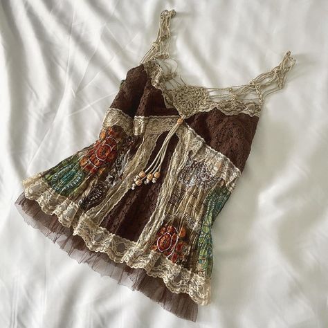 Look what I just found on Depop 🙌 https://depop.app.link/GEiU02Lymzb Vintage Hippie Shirts, Unique Styles Outfits, Artcore Aesthetic Outfit, Whimisigothic Clothes, Mexican Style Outfits, Hippie Cowgirl Style, Indie Tops, Crochet Camisole, Revamp Clothes