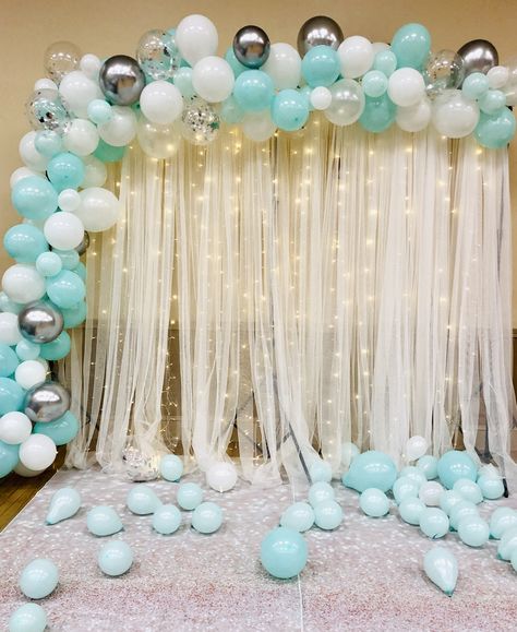 Beautiful elegant teal, white, silver balloon backdrop. Tiffany Blue Sweet Sixteen Backdrop with lights. Sweet 16 Teal And Silver, Turquoise Sweet 16 Decorations, Teal And White Birthday Decorations, Aqua Sweet 16 Decorations, Sweet Sixteen Party Color Schemes, Teal White And Silver Party Decorations, Blue And White Theme Party Decoration, Tiffany Blue Balloons, Backdrop With Lights And Balloons