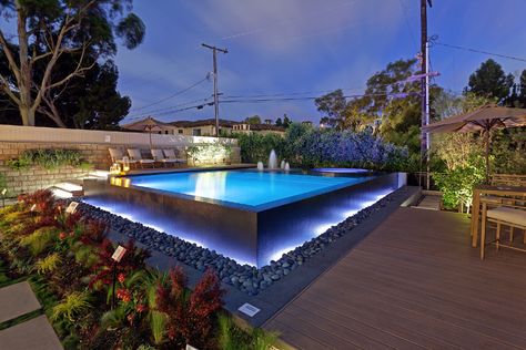 Above ground infinity edge pool in Manhattan Beach, CA Above Ground Infinity Pool, Cocktail Pool Ideas, Swimming Pool Lighting Ideas, Above Ground Pool Lighting, Pool With Infinity Edge, Infinity Edge Spa, Pool Designs Modern, Pool Design Modern, Luxury Pools Backyard