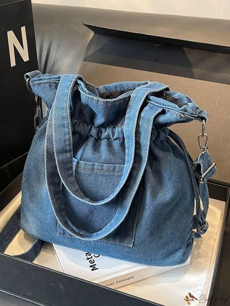 Women's denim drawstring bucket bag is stylish, chic, and functional. It is perfect for everyday #Upcycling #Jeans_Tricks #Work_Commute #Denim_Bag_Diy Jeans Tricks, Bag Out Of Jeans, Diy Denim Wallet, Denim Duffle Bag, Bucket Bag Diy, Upcycled Denim Diy, Diy Shoulder Bag, Work Commute, Denim Wallet