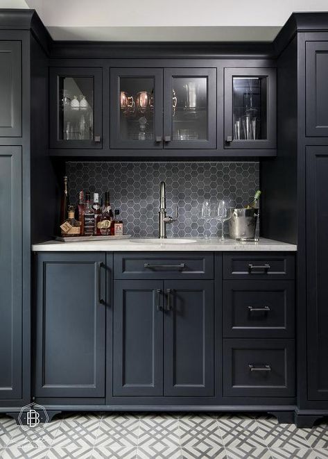 Chic black wet bar boasts black shaker cabinets donning matte black pulls and a white granite countertop. Black Shaker Cabinets, Wet Bar Cabinets, Wet Bar Designs, Contemporary Cabinet, Home Wet Bar, Home Bar Rooms, Basement Bar Designs, Home Coffee Bar, Home Office Inspiration