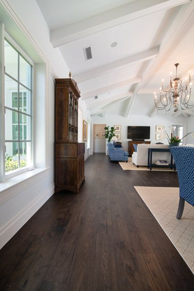 Dark Wood Wide Plank Floors, Great Room Dark Floors, Beach House Dark Floors, Dark Wood Floors With Dark Furniture, Tile With Dark Wood Floors, Dark Floor Boards, Decorating With Dark Floors, Espresso Floors Living Room, Dark Lvp Flooring Planks Living Rooms