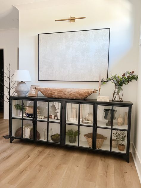 Glass Buffet Cabinet Decor, Wall Art Over Sideboard, Glass Sideboard Styling, Top Of Credenza Decor, Buffet Decorating Ideas Dining Room, Decorate Sideboard In Living Room, Styled Buffet Table, Long Buffet Table Decor, Side Board Styling Dining Rooms