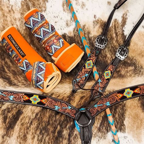 Brightly colored turquoise arrows shoot across gorgeous tooled flourishes set off by a black leather background. Brightly colored beaded inlays add a colorful pop to this fun, dynamic tack set. Note - The tack sets include one headstall and one breast collar. You must select tack set in the drop down to order both pieces. Otherwise you are ordering individual items. The boots and reins are shown for demonstration only and are not included in a tack set purchase. They may be purchased separately. Barrel Tack Sets, Tackroom Ideas, Black Leather Background, Western Riding Tack, Bling Tack Sets, Western Tack Sets, Beaded Cactus, Barrel Racing Tack Rodeo, Bling Horse Tack