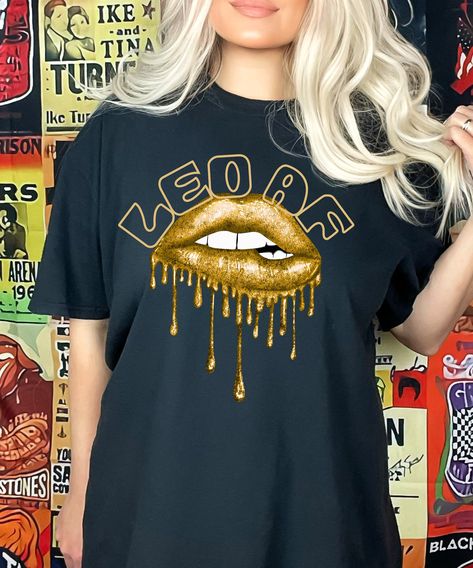 Display your Leo pride with this bold and stylish Leo AF dripping lips graphic. Perfect for Leo birthdays, astrology enthusiasts, and anyone who loves to rock their zodiac sign.  Makes a great present for friends, family, or anyone who are Leos or have a Leo in their life. Be distinct and let everyone know you are Leo AF. Comfort Colors introduces the "Comfort Colors 1717" garment-dyed t-shirt; a fully customizable tee made 100% with ring-spun cotton. The soft-washed, garment-dyed fabric brings Leo Fashion, Leo Personality, Lips Graphic, Dripping Lips, Lips Shirt, Queen Tee, Leo Birthday, Gold Lips, Glamorous Party