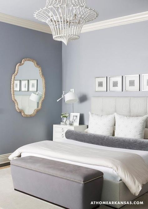 At Home in Arkansas - bedrooms - Gray room, tufted headboard, gray upholstered bench, white chandelier, gold mirror, white nightstand,  Melissa Glam Bedrooms, Blue Gray Bedroom, Bedroom Transitional, Made Bed, Grey Accent Wall, Transitional Bedroom, Light Grey Walls, Bedroom Remodel, Eclectic Bedroom