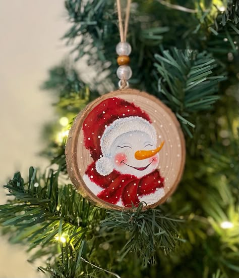 Hand painted Snowman Ornaments, Original Painting on Natural Wood Slice.  Two of the ornaments are not for hanging but are used with the acrylic easel stand. Easel stands are included. Unique decor and perfect gift for your relatives and friends. You can also check my other Handpainted Ornaments: https://setyartgallery.etsy.com/listing/1586212238 * Free Gift Bag available. * Wood slice ornament size +-3.5 inch (natural wood slices, so sizes vary).  * Back Signed You will receive TRACKING number Christmas Ornament Wood Slice, Christmas Ornaments Wood Slice, Acrylic Easel, Painted Snowman, Painting Unique, Wood Slice Art, Easel Stand, Snowman Painting, Handmade Christmas Tree