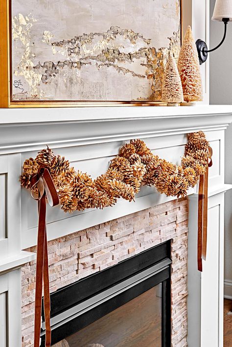 fireplace-pinecone-decoration-d53f0e2f Decorating With Pinecones, Pine Cone Christmas Decorations, Classic Holiday Decor, Pinecone Garland, Winter Door Decorations, Painted Pinecones, Winter Wreath Diy, Winter Centerpieces, Cone Crafts