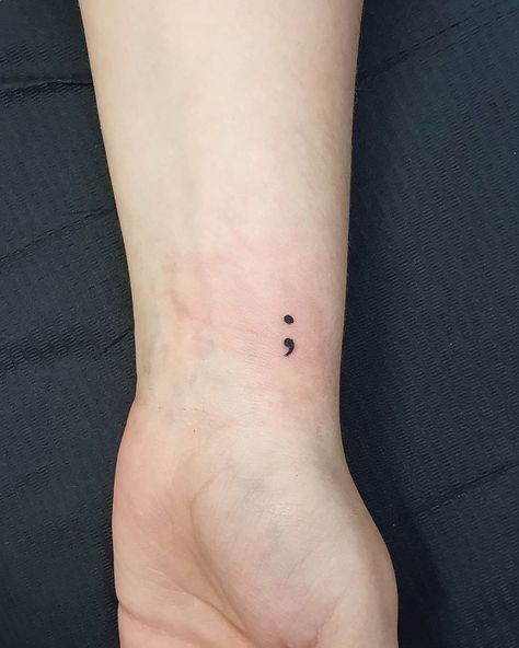 51 Semicolon Tattoos On Wrist You Should Always Think Check more at https://imagestag.com/51-semicolon-tattoo-on-wrist/ Dot Comma Tattoo, Small Semicolon Tattoo Wrist, Dot And Comma Tattoo, Semi Colon Tattoo Wrist, Semicolon Tattoo On Wrist, Simple Semicolon Tattoo, Semi-colon Tattoo Ideas Wrist, Ocd Tatoos Design, Tattoos For Ocd