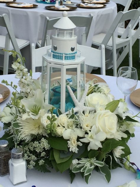 Lighthouse Lantern Centerpiece, Diy Nautical Centerpieces, Lighthouse Wedding Centerpieces, Wedding Centerpieces Nautical, Lighthouse Theme Wedding, Beach Lantern Centerpieces, Nautical Centerpiece Ideas Wedding, Lighthouse Centerpiece Wedding, Lighthouse Centerpiece Ideas