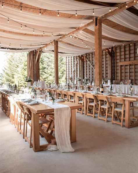 Our Natural Wood Folding Chairs look wonderful in this rustic Bowen Island reception! Photography: @eldunfieldphotography DOC: Stephanie @encoreeventswedding Venue: Red Barn Bowen Island Catering: @the.nomadic.kitchen HMUA: @mua.caitlin DJ: @willsea604 Florals: @ourlittleflowercompany Rentals: @pedersenseventrentals Bridal Gown: @alexandragrecco Bridal Boutique: @thedresstheoryseattle Groom’s Suit: @boss Wood Folding Chair Wedding, Pole Shed Wedding Receptions, Pole Barn Wedding Reception, Pole Barn Wedding, Small Pole Barn, Farm Reception, Shed Wedding, Bowen Island, Backyard Wedding Ideas