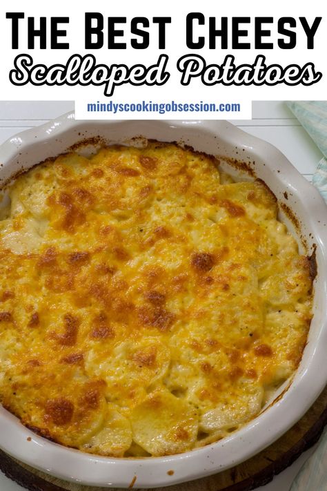 Sliced potatoes are layered with a creamy cheese sauce, topped with more cheddar cheese then baked until the potatoes are tender and the cheese is golden brown. Made with Russet potatoes, onion, butter, milk, flour, salt and pepper, it's the perfect side dish for Sunday dinner or holiday dinner. via @mindyscookingobsession Slow Cooker Russet Potatoes, Cheese Scalloped Potatoes Easy, Scalloped Potatoes With Milk, Russet Potato Recipes Side Dishes, Cheesy Scalloped Potatoes Easy, Russet Potato Side Dishes, Best Cheesy Scalloped Potatoes, Easy Cheesy Scalloped Potatoes, Cheese Scalloped Potatoes