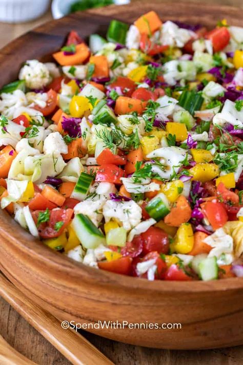 This is the best chopped salad! With 7 different veggies, it is packed with healthy crunchy flavors. Even tossed in the tasty dressing it still lasts for days in the fridge. Perfect for meal prepping lunches! #spendwithpennies #marinatedchoppedsalad #vegetablesalad #sidedish #lunch Best Chopped Salad, Chopped Salad Dressing, Lunch Quick, Chopped Salad Recipes, Tossed Salad, Veggie Salad, Chopped Salad, Meal Prepping, Vegetable Salad