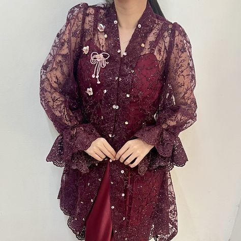 Exquisite detailing and rich color make it a timeless statement piece. Yeva Kebaya Top in Burgundy by @jaleela.id Available at Dresshaus.com Kebaya Burgundy, Kebaya Embroidery, Kondangan Outfit, Bead Embroidery Tutorial, Embroidery Tutorials, Dream Dress, Beaded Embroidery, Rich Color, Statement Pieces