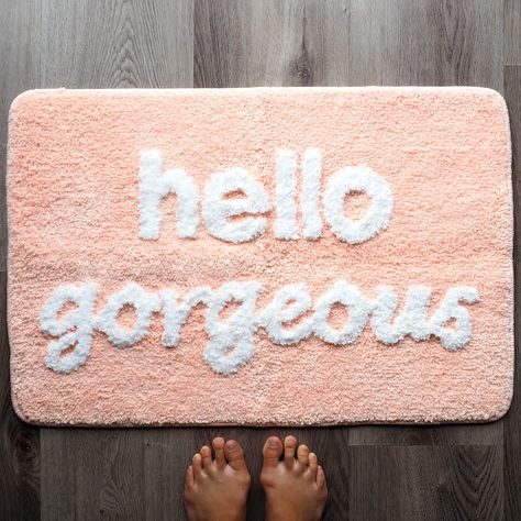 PRICES MAY VARY. ✩ Positive Memorable Gift – Why settle for an ordinary mat? Add some fun and positivity to your bathroom or front door with this uplifting Hello Gorgeous bath mat! The heart-warming message will bring a smile to every morning. The beautiful colors and playful design make it the perfect gift for a housewarming, anniversary, birthday or Christmas to show you care. A gift they’ll be sure to love! ✩ Premium Quality and Softness – You’ll be delightfully awed by the fluffy softness! S Pink Bathroom Rugs, Fun Bathroom Decor, Fun Bathroom, Cute Bathroom, Gorgeous Bathroom, Girls Bathroom, Peach Orange, Bath Linens, Candle Shapes