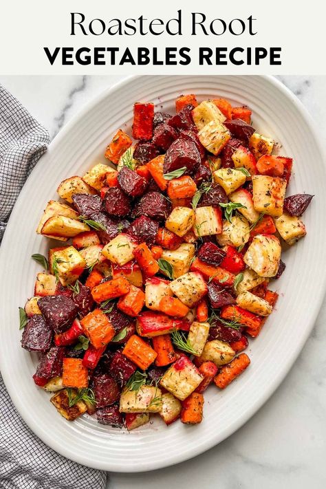 Oven roasted root vegetables on a large serving platter. Oven Roasted Root Vegetables, Root Vegetable Salad, Roasted Fall Vegetables, Root Vegetables Recipes, Roasted Veggies In Oven, Colorful Carrots, Roasted Root Veggies, Thanksgiving Vegetables, Roasted Vegetable Recipes