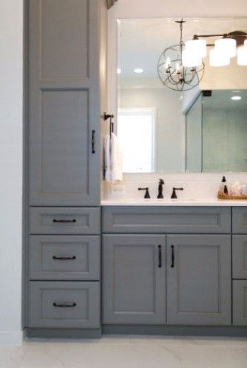 Gray bathroom vanity with towers and drawers for storage in bathroom remodeled by KBF Design Gallery #BathroomFittings Guest Bathroom Remodel, Grey Bathroom Vanity, Tile Remodel, Gray Cabinets, Floor Remodel, Budget Bathroom, Trendy Bathroom, Diy Remodel, Grey Bathrooms